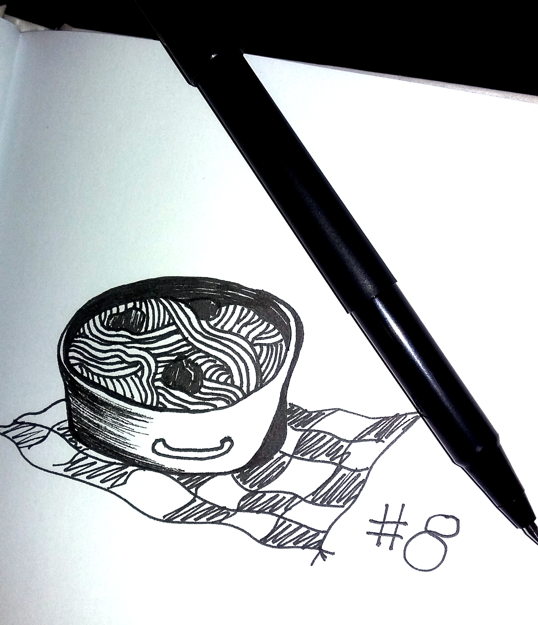 drawing of a pot of spaghetti on a picnic blanket