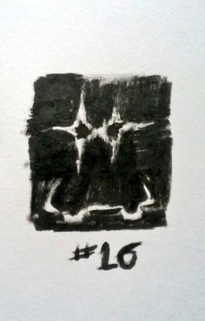 blurry drawing of a triangular figure in darkness with bright 4-pointed stars for eyes